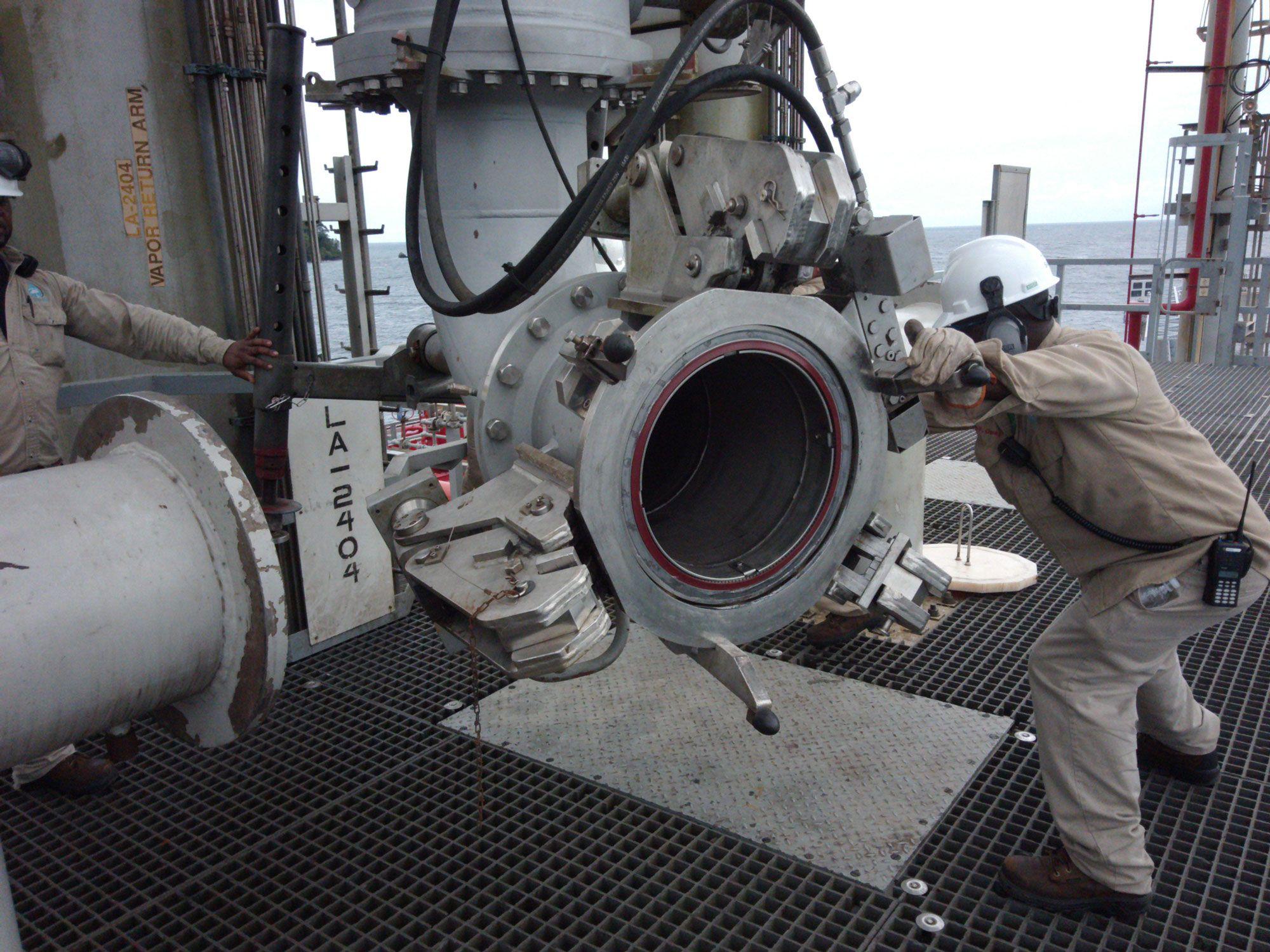 A man working with large equipment